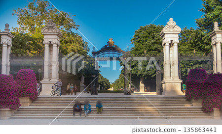 Entrance to Buen Retiro Park - one of largest parks in Madrid timelapse Entrance to Buen Retiro Park - one of largest parks in Madrid timelapse 135863441