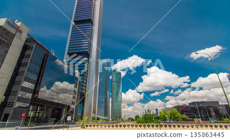 Skyscrapers timelapse hyperlapse in the Four Towers Business Area with the tallest skyscrapers in Madrid and Spain Skyscrapers timelapse hyperlapse in the Four Towers Business Area with the tallest skyscrapers in Madrid and Spain 135863445