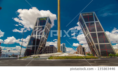 KIO towers or Gateway of Europe timelapse hyperlapse from Plaza de Castilla in Madrid, Spain. KIO towers or Gateway of Europe timelapse hyperlapse from Plaza de Castilla in Madrid, Spain. 135863446
