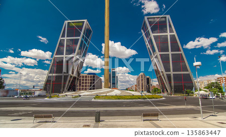 KIO towers or Gateway of Europe timelapse from Plaza de Castilla in Madrid, Spain. KIO towers or Gateway of Europe timelapse from Plaza de Castilla in Madrid, Spain. 135863447