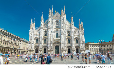 The Duomo cathedral timelapse hyperlapse. Front view with people walking on square 135863473