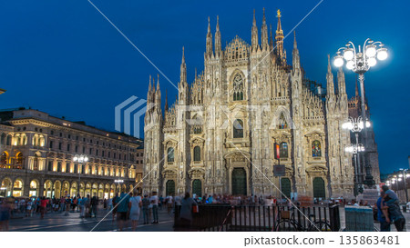 Milan Cathedral day to night timelapse Duomo di Milano is the gothic cathedral church of Milan, Italy. Milan Cathedral day to night timelapse Duomo di Milano is the gothic cathedral church of Milan, Italy. 135863481