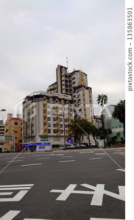 A local city intersection and a calm streetscape 135863501