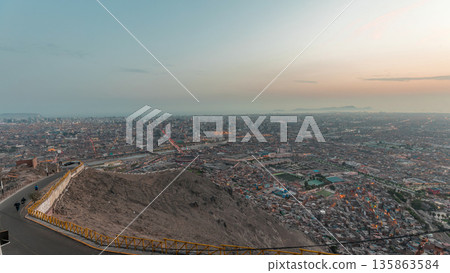 Aerial view of Lima skyline day to night timelapse from San Cristobal hill. 135863584
