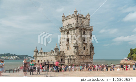 Torre de Belem or Belem Tower timelapse hyperlapse on the Rio Tejo in Belem district of the City of Lisbon in Portugal. 135863624