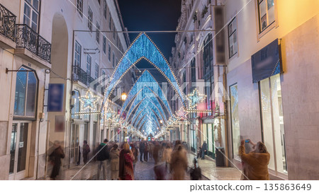 Night timelapse hyperlapse of Christmas lights and decorations in downtown Lisbon at Chiado Night timelapse hyperlapse of Christmas lights and decorations in downtown Lisbon at Chiado 135863649