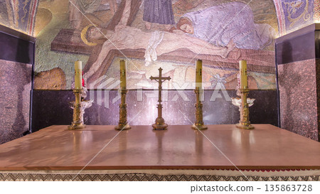 Cross and candles in the Church of the Holy Sepulcher timelapse hyperlapse. 135863728