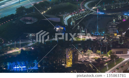 Kuwait City cityscape night timelapse with music fountains in park 135863781