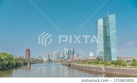 Hyperlapse of Frankfurt skyline featuring the modern ECB headquarters skyscraper. Frankfurt am Main, Germany Hyperlapse of Frankfurt skyline featuring the modern ECB headquarters skyscraper. Frankfurt am Main, Germany 135863808
