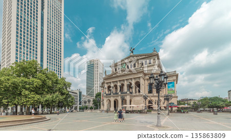 Hyperlapse of the Alte Oper or Old Opera house in Frankfurt, a concert hall in Opernplatz. Germany Hyperlapse of the Alte Oper or Old Opera house in Frankfurt, a concert hall in Opernplatz. Germany 135863809