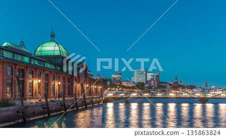 Hyperlapse of Altona Fish Market in Hamburg transition from day to night. Germany 135863824