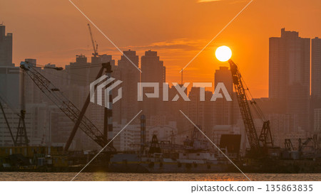 Hong Kong Sunset, View from kowloon bay downtown timelapse Hong Kong Sunset, View from kowloon bay downtown timelapse 135863835