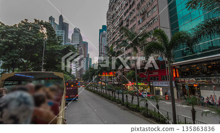 A Hong Kong streets view timelapse from open-top touristic bus during Hong Kong island's touring 135863836