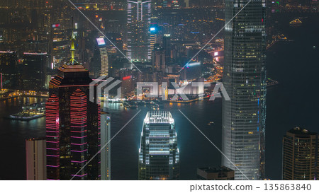 Hong Kong city skyline aerial timelapse at night with Victoria Harbor and skyscrapers Hong Kong city skyline aerial timelapse at night with Victoria Harbor and skyscrapers 135863840