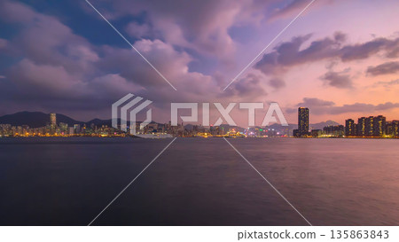 Hong Kong day to night, view from Kowloon bay downtown timelapse Hong Kong day to night, view from Kowloon bay downtown timelapse 135863843