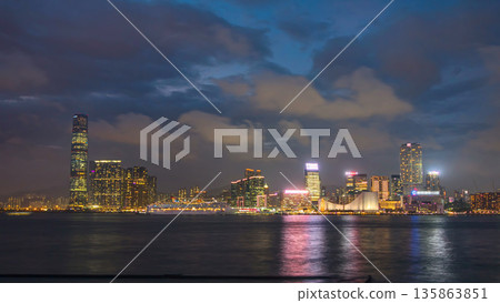 Skyline panorama timelapse day to night with International Commerce Centre in West Kowloon, Hong Kong. Skyline panorama timelapse day to night with International Commerce Centre in West Kowloon, Hong Kong. 135863851