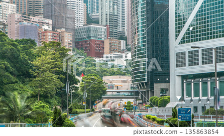 Hong Kong traffic timelapse near bank tower in Central District of Hong Kong. 135863854