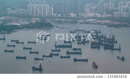 Victoria Harbour and Port of Hong Kong from Victoria Peak timelapse with many ships. Victoria Harbour and Port of Hong Kong from Victoria Peak timelapse with many ships. 135863858
