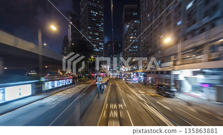 View from double-decker tram on street of HK timelapse hyperlapse. 135863881