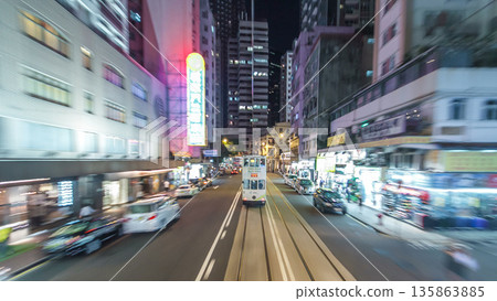 View from double-decker tram on street of HK timelapse hyperlapse. 135863885