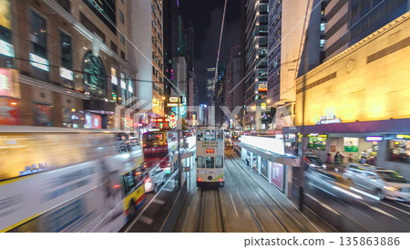 View from double-decker tram on street of HK timelapse hyperlapse. View from double-decker tram on street of HK timelapse hyperlapse. 135863886