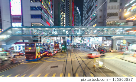 View from double-decker tram on street of HK timelapse hyperlapse. 135863887