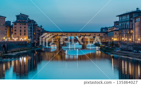River Arno and famous bridge Ponte Vecchio day to night timelapse after sunset in Florence, Tuscany, Italy River Arno and famous bridge Ponte Vecchio day to night timelapse after sunset in Florence, Tuscany, Italy 135864027