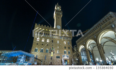 Arnolfo tower of Palazzo Vecchio timelapse hyperlapse on the Piazza della Signoria at twilight in Florence, Tuscany, Italy Arnolfo tower of Palazzo Vecchio timelapse hyperlapse on the Piazza della Signoria at twilight in Florence, Tuscany, Italy 135864030