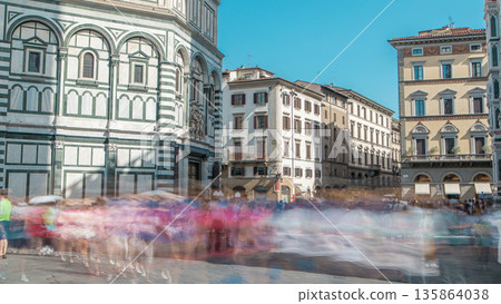 Tourists near Florence Baptistery San Giovanni timelapse on Piazza San Giovanni. Tourists near Florence Baptistery San Giovanni timelapse on Piazza San Giovanni. 135864038