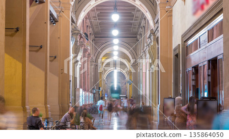Arcade in building at Republic Square night timelapse Italy 135864050