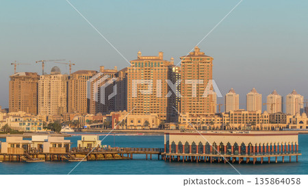 View from Katara Beach timelapse in Doha, Qatar, towards the Pearl. 135864058