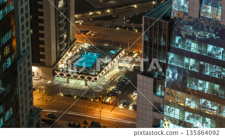 The skyline of the West Bay area from top in Doha timelapse, Qatar. 135864092