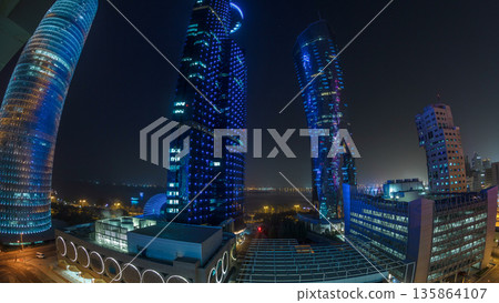 The skyline of the West Bay area from top in Doha timelapse, Qatar. The skyline of the West Bay area from top in Doha timelapse, Qatar. 135864107