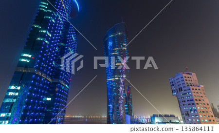 The skyline of the West Bay area from top in Doha timelapse, Qatar. 135864111