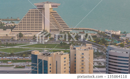 Doha West Bay view with hotel park evening timelapse, Doha, Qatar, Middle East. 135864118