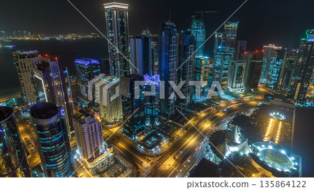 The skyline of the West Bay area from top in Doha timelapse, Qatar. The skyline of the West Bay area from top in Doha timelapse, Qatar. 135864122