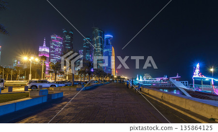 The skyline of Doha by night with starry sky seen from Corniche timelapse hyperlapse, Qatar The skyline of Doha by night with starry sky seen from Corniche timelapse hyperlapse, Qatar 135864125