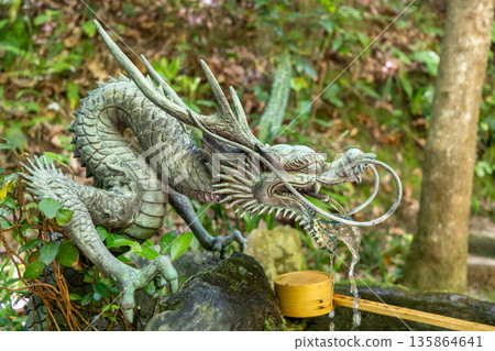 Bronze dragon chozuya at Mitaki-Dera temple in Hiroshima, Japan Bronze dragon chozuya at Mitaki-Dera temple in Hiroshima, Japan 135864641