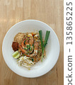 Authentic Thai Pad Thai Noodles with Fresh Shrimp, Peanuts, and Lime 135865225