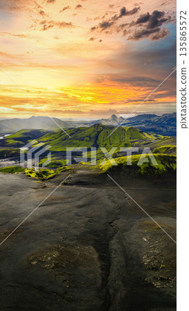 Aerial View of Iceland's Volcanic Landscape with River and Sunset Aerial View of Iceland's Volcanic Landscape with River and Sunset 135865572