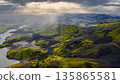 Aerial View of Iceland's Volcanic Landscape with River and Moss 135865581