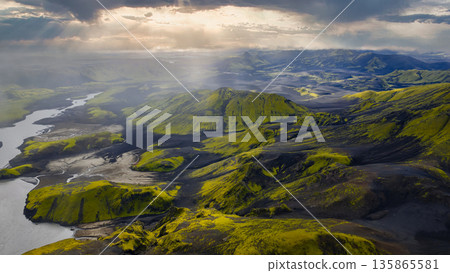 Aerial View of Iceland's Volcanic Landscape with River and Moss 135865581