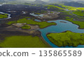Aerial View of Iceland's Moss Covered Terrain and Volcanic Soil 135865589