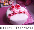 Beautiful children's pink cake for a newborn girl 135865843