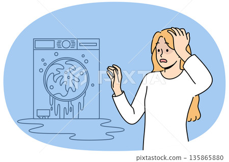 Broken washing machine shocks housewife who needs help of household appliance repairman 135865880