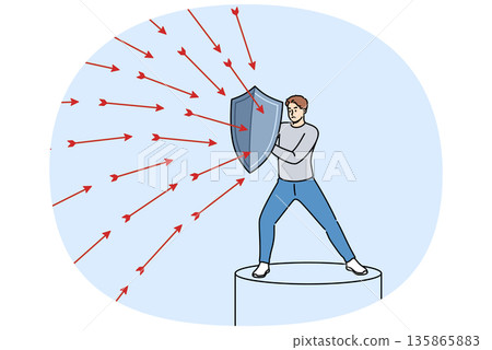 Brave man defends himself from problems using shield to deflect flying arrows from enemies 135865883