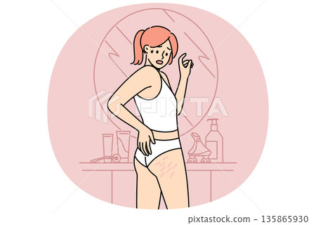 Woman sees cellulite on butt and thighs standing near mirror, needs to combat excess weight Woman sees cellulite on butt and thighs standing near mirror, needs to combat excess weight 135865930
