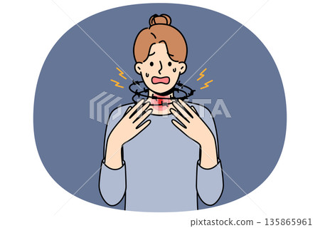 Woman suffering from suffocation and asthma screams, standing with barbed wire around neck 135865961