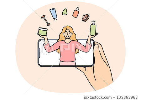 Woman beauty blogger juggles with cosmetics, looking out from phone, giving tips on applying makeup Woman beauty blogger juggles with cosmetics, looking out from phone, giving tips on applying makeup 135865968