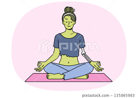 Green witch meditating in lotus position doing yoga on halloween to restore health 135865983